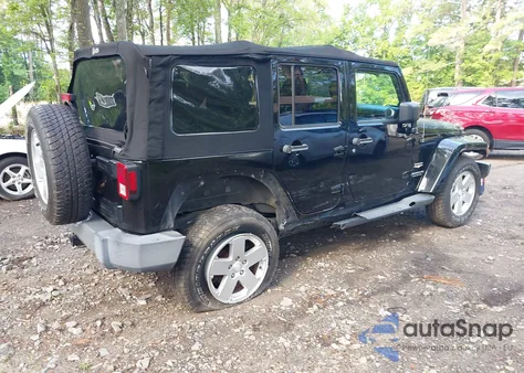 2012 Jeep Wrangler Unlimited Sahara из США, поврежденный, VIN 1C4HJWEG2CL117560